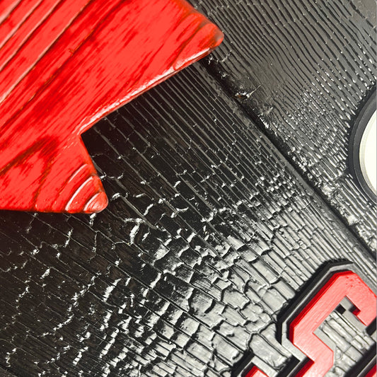 Side angle of Canadian wood flag showing thickness and 3D layered maple leaf and lettering
