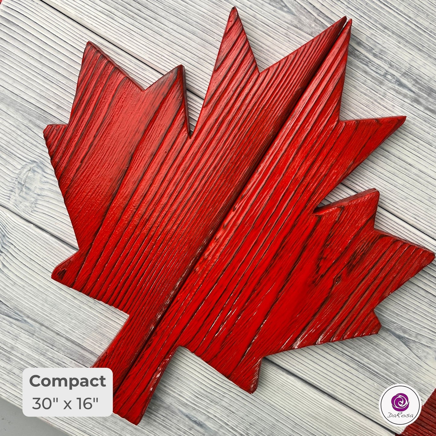 Close-up of handcrafted Canadian wood flag showing charred cedar grain and detailed texture
