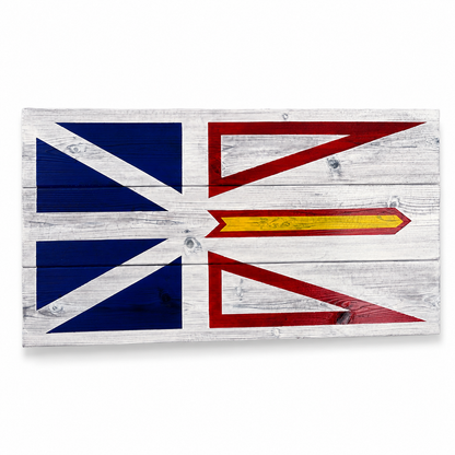 Wooden plaque with a stylized flag design on a white background