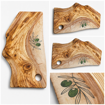Wooden cutting boards with olive designs on a white background