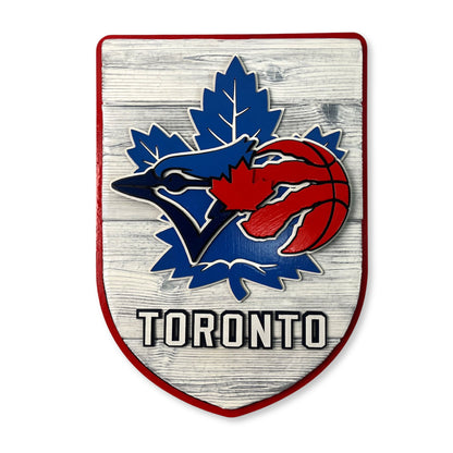 toronto sports sign with baseball blue jays, maple leafs and raptors
